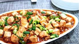 Mapo doufu or mapo tofu (éº»å©†è±†è…) is a popular Chinese dish from Sichuan province. It consists of tofu set in a spicy sauce, typic...